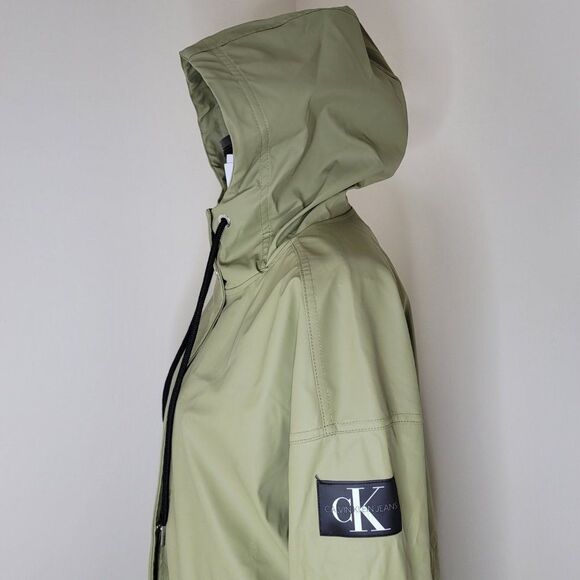 Calvin Klein Jeans Solid Monogram Logo Patch Hooded Rain Jacket - Picture 3 of 10